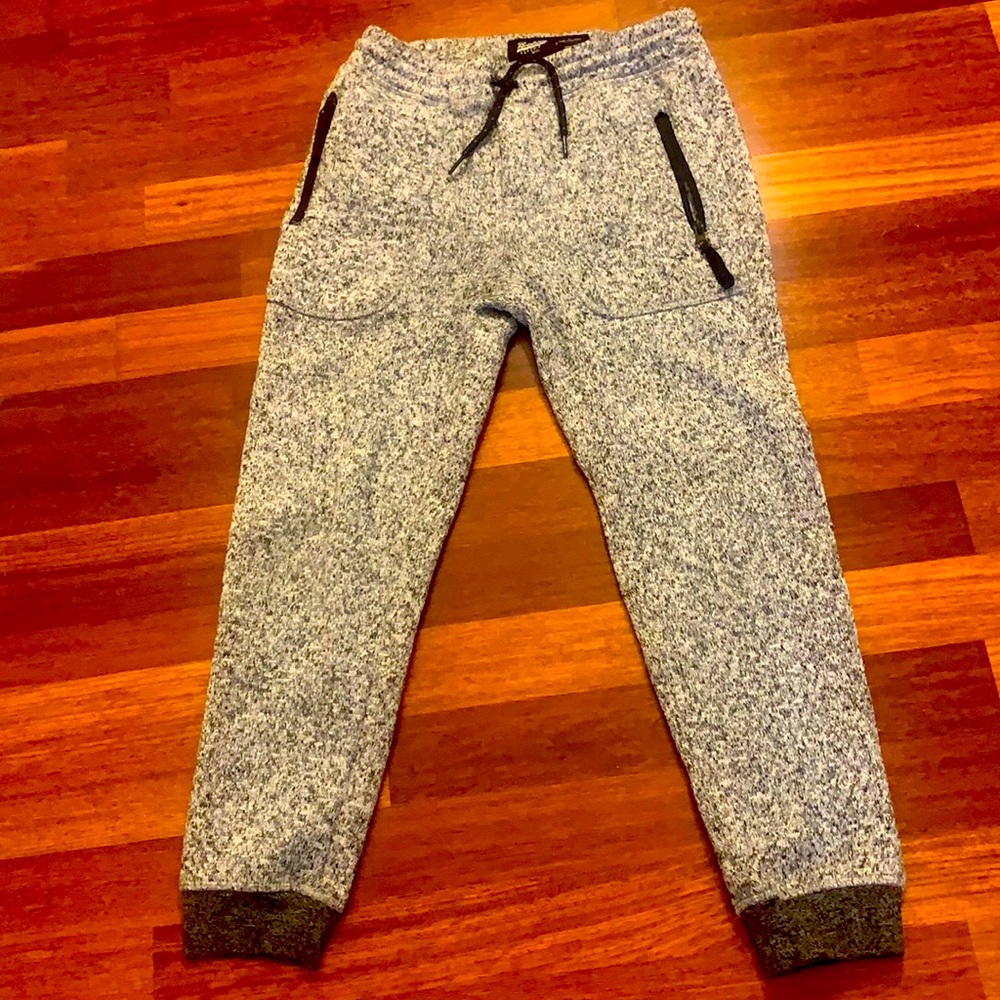 Boys Tilly’s gray joggers with black accents.  These joggers are size M